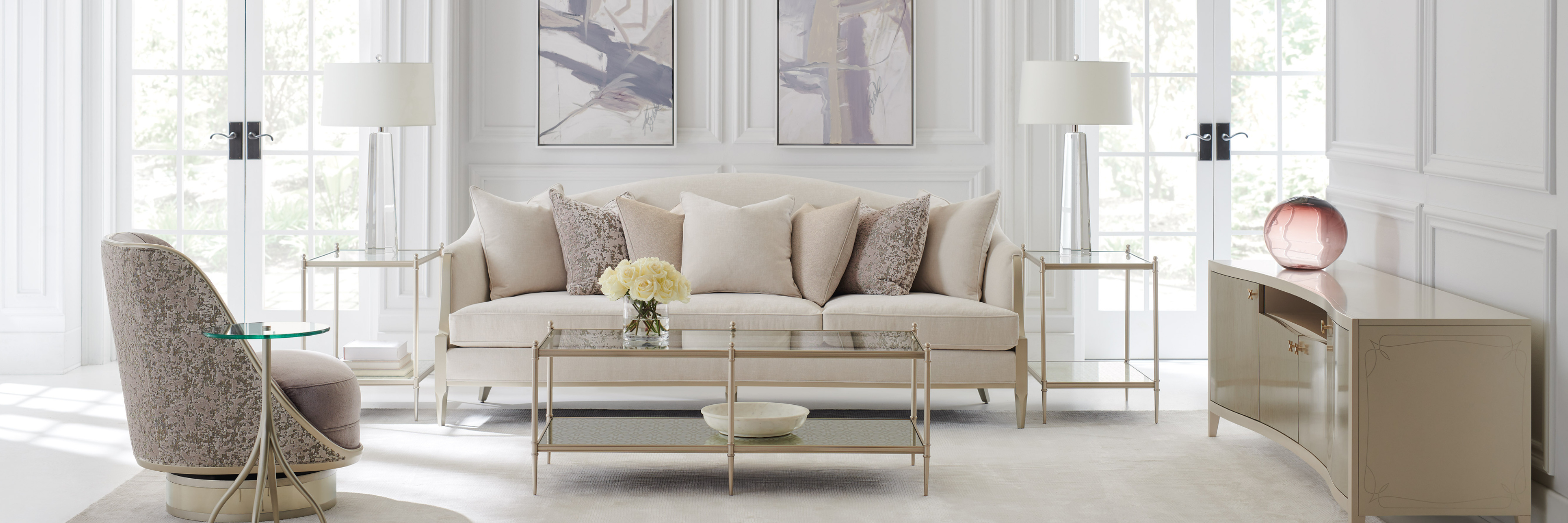 Caracole modern glamour interior — sculptural furniture with layered metallic finishes